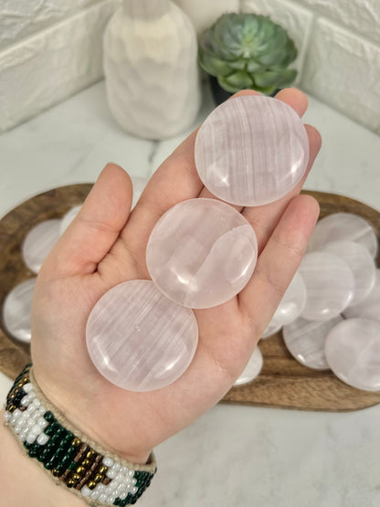 1 pink mangano calcite “cookie” flat stone