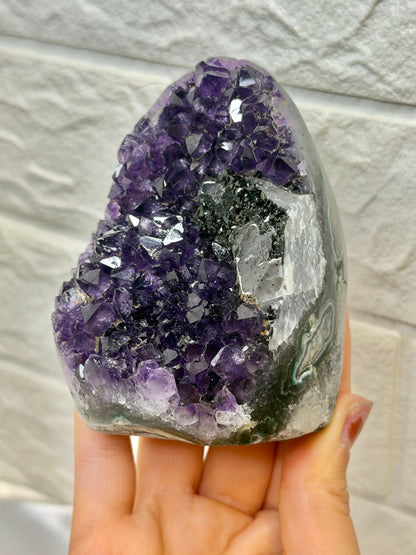 Beautiful purple Uruguay amethyst with calcite and goethite Q
