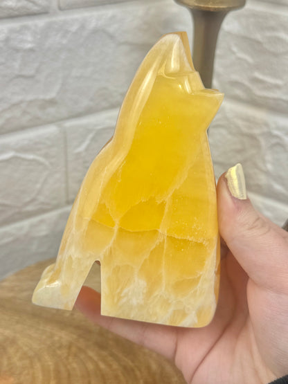 1 juicy honey comb calcite wolf carving from Utah