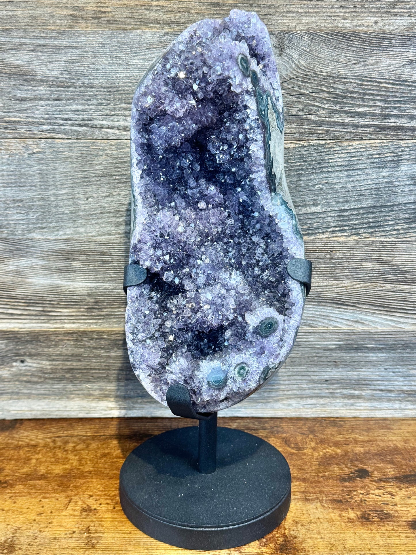 XXL amethyst with stalactites on custom stand from Uruguay