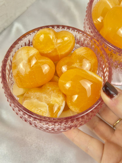 1 juicy orange calcite heart from Mexico