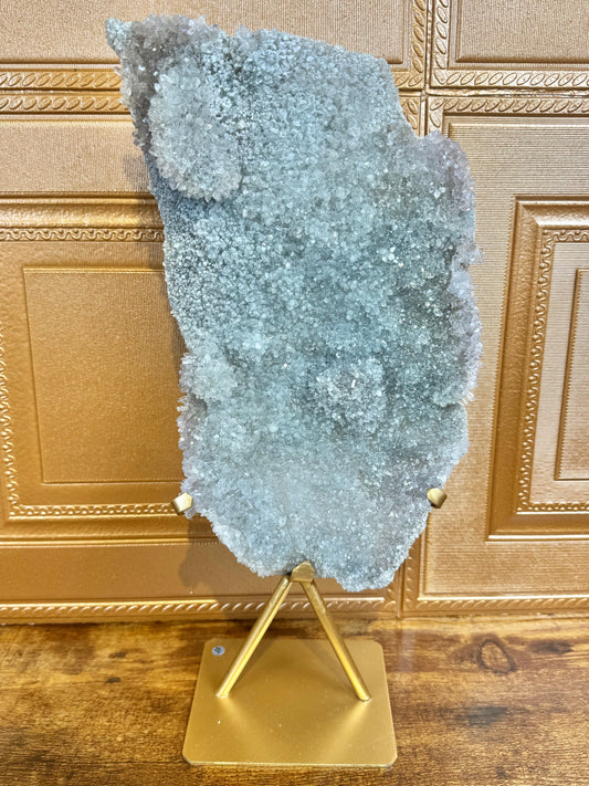 XL sage amethyst crust on gold stand from Brazil