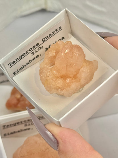 1 tangerose quartz specimen from Africa
