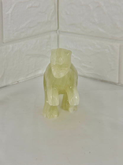 1 adorable green calcite dinosaur