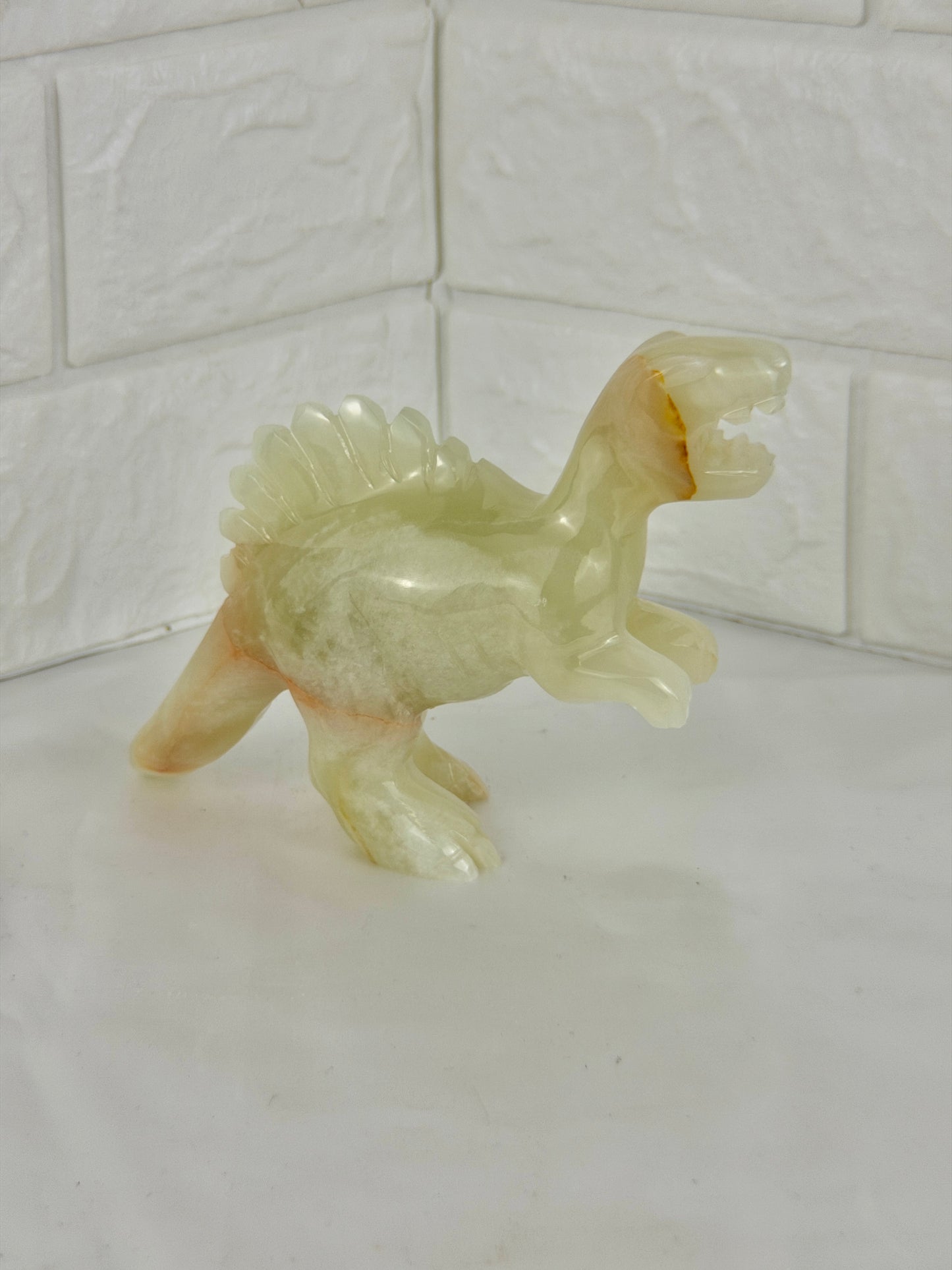 1 adorable green calcite dinosaur