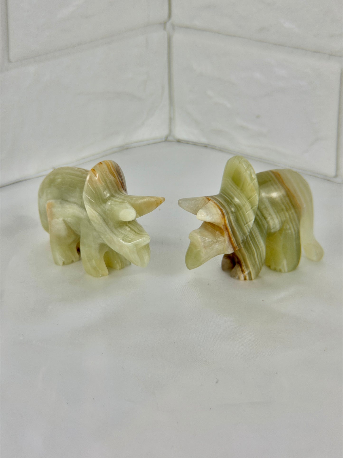 1 green calcite triceratops carving