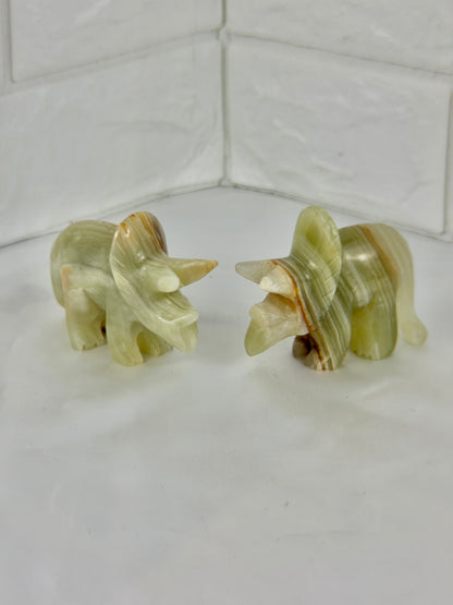 1 green calcite triceratops carving