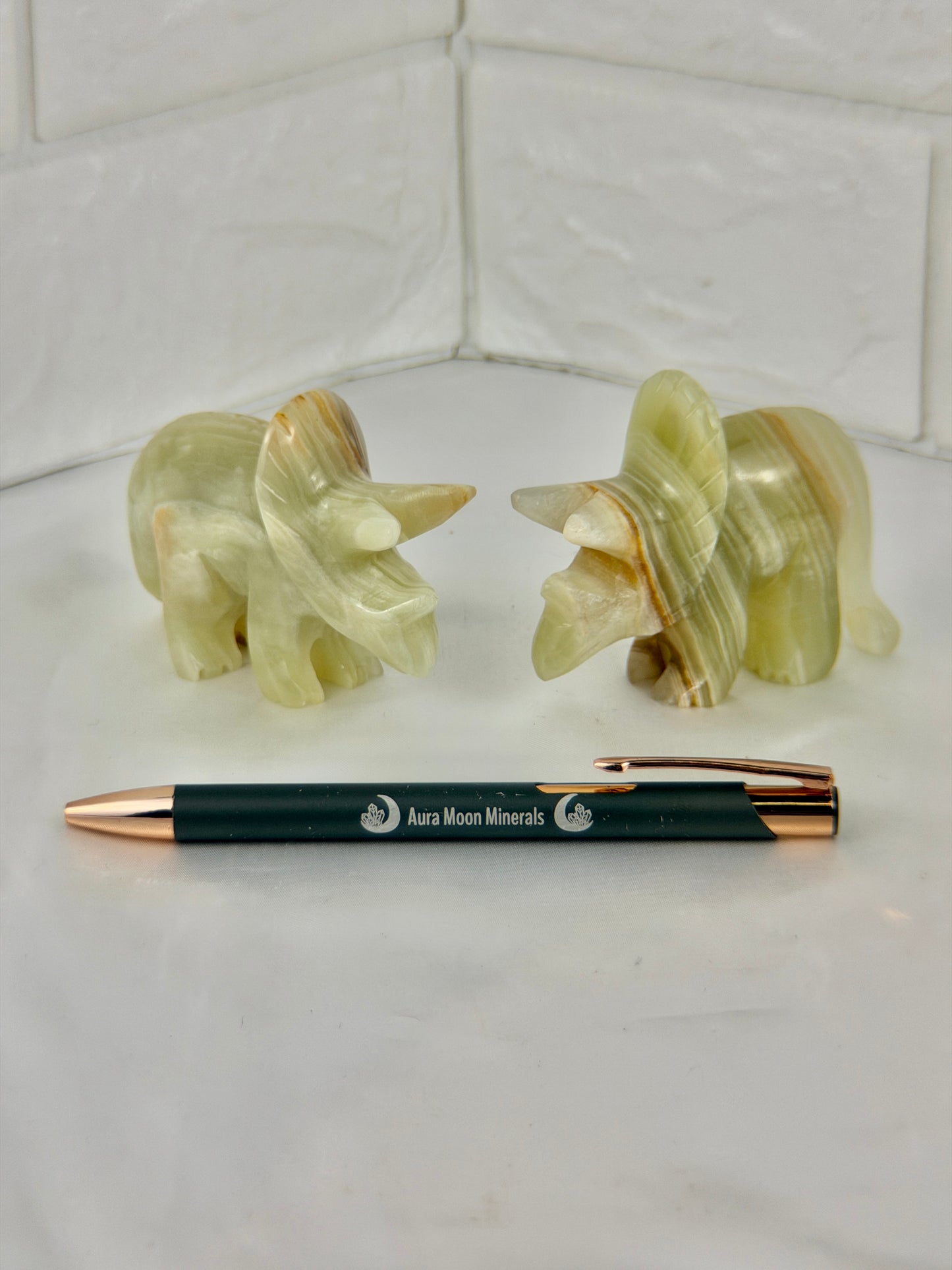 1 green calcite triceratops carving