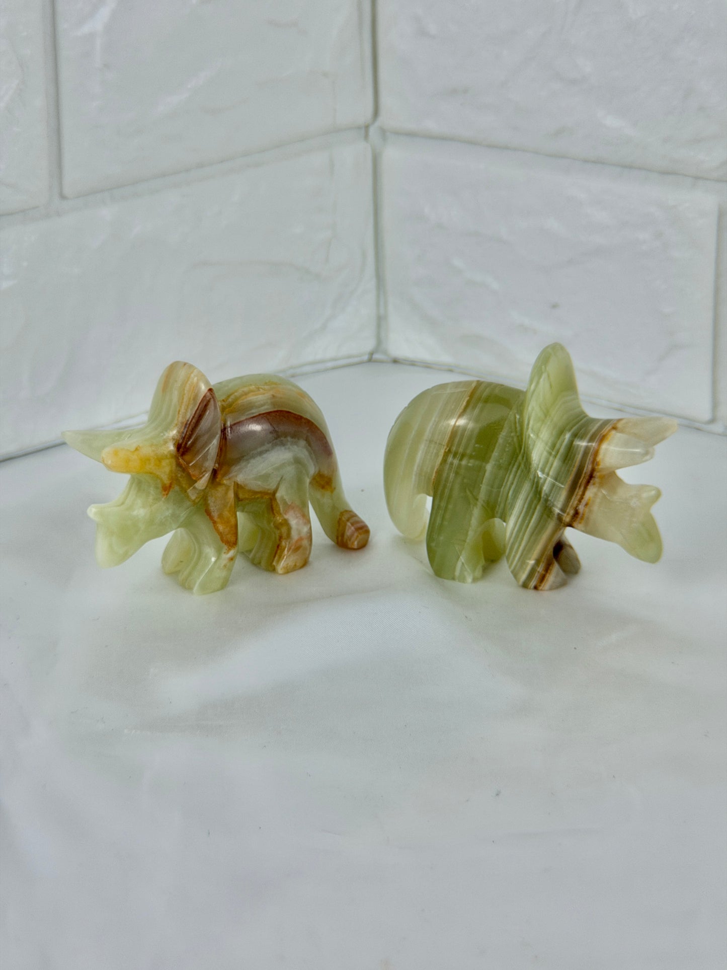 1 green calcite triceratops carving