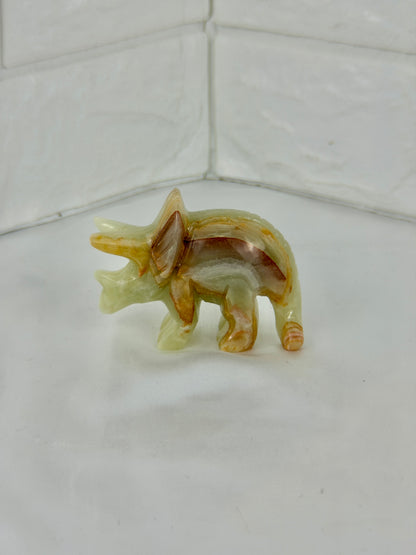 1 green calcite triceratops carving