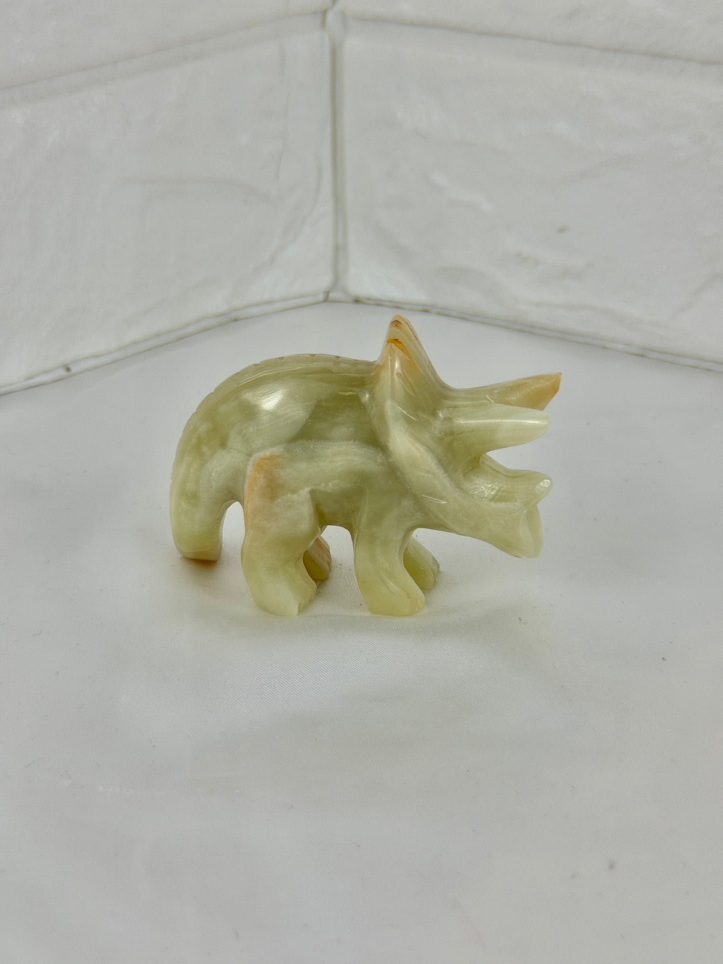 1 green calcite triceratops carving