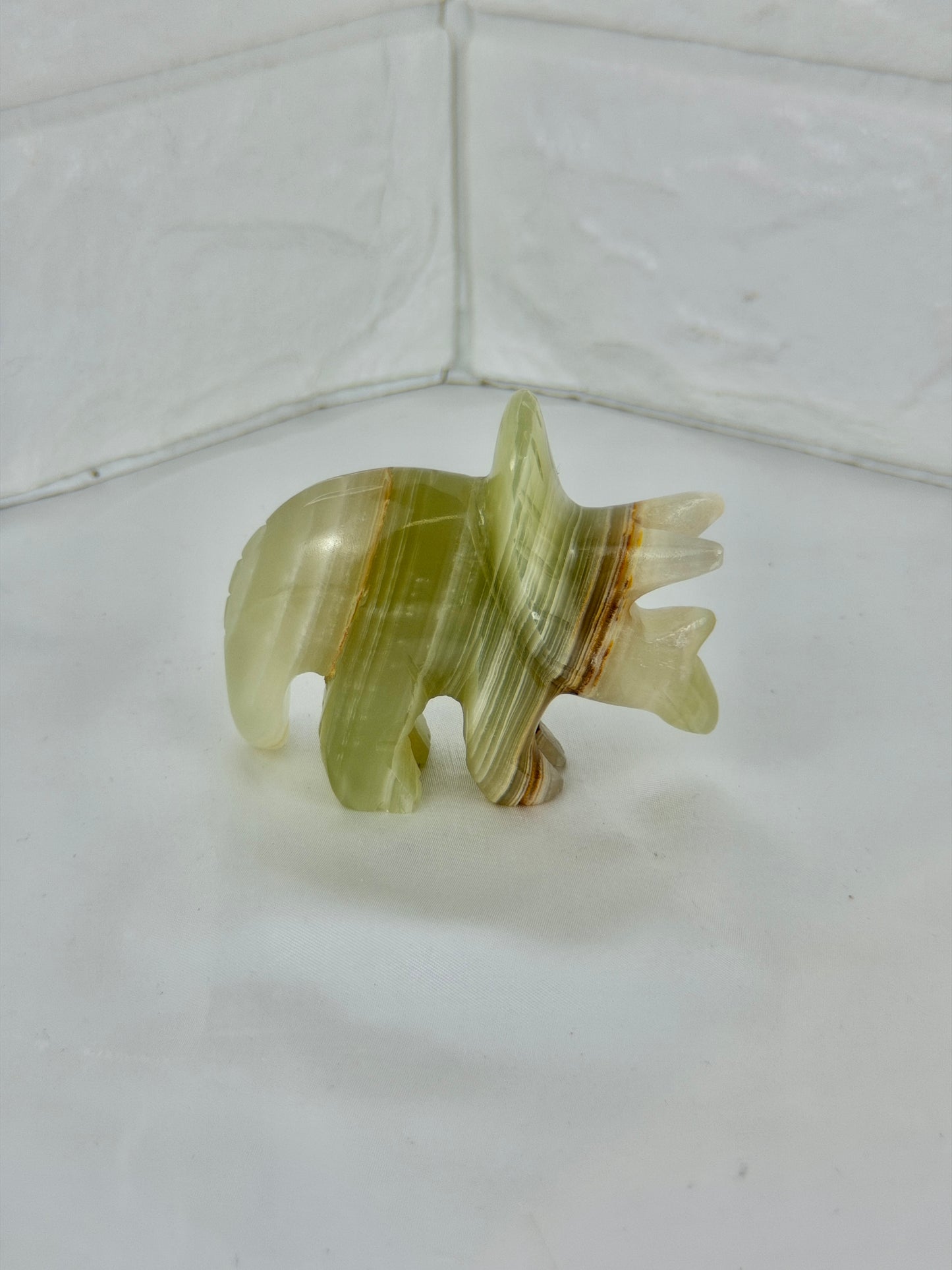 1 green calcite triceratops carving