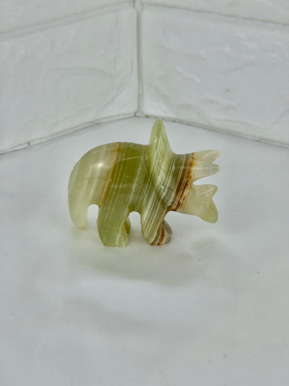 1 green calcite triceratops carving