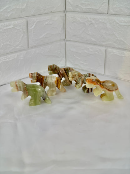 1 green calcite T-rex carving