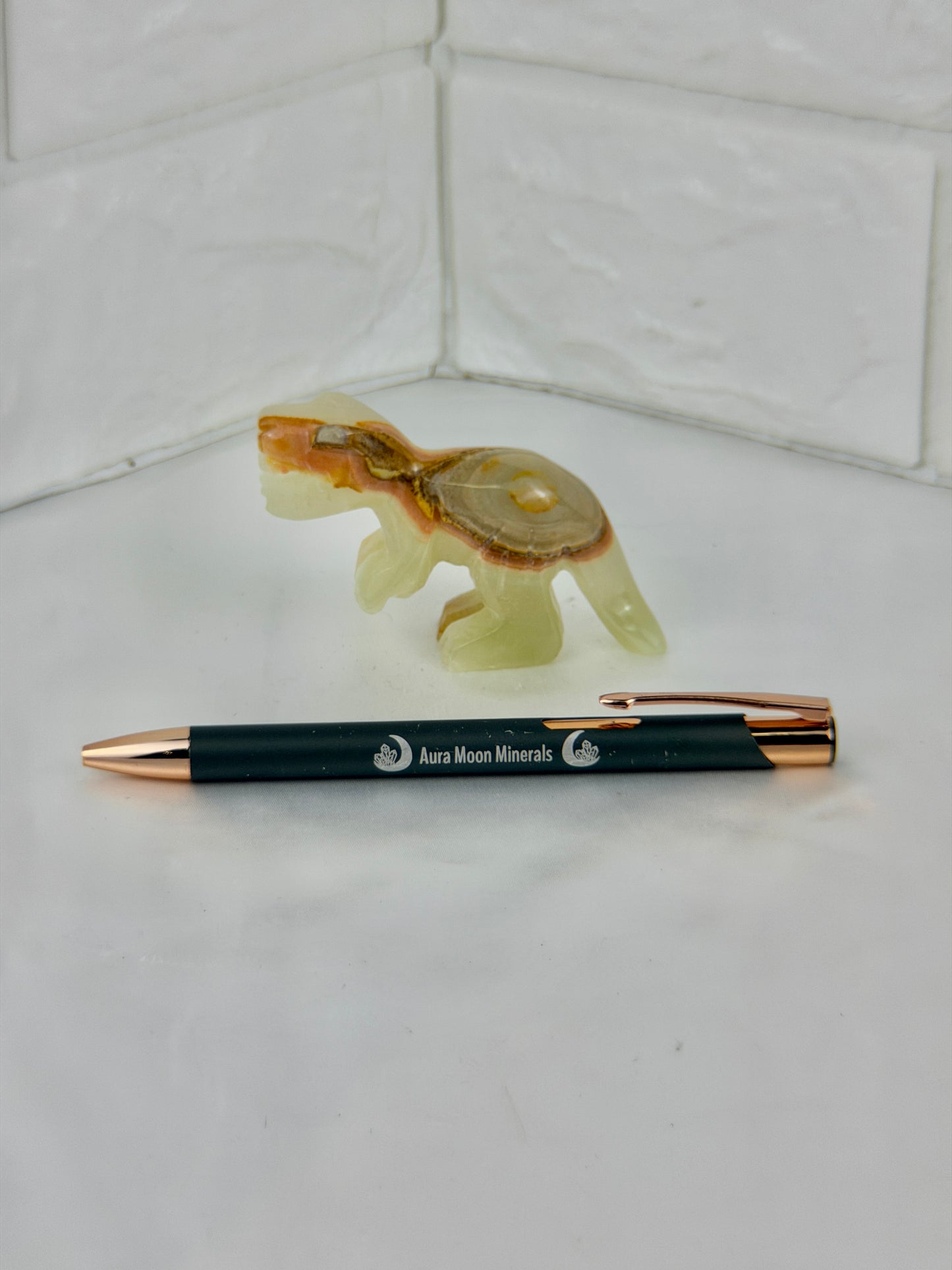 1 green calcite T-rex carving