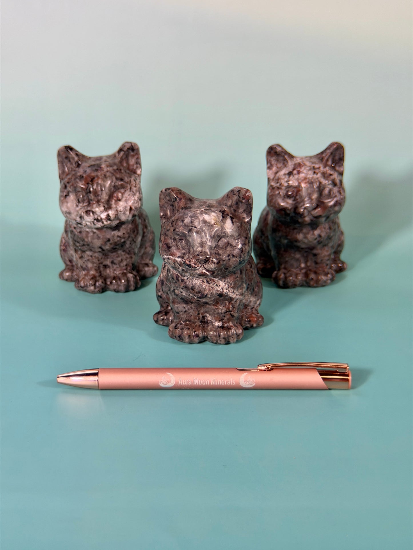 1 adorable larvikite cat carving