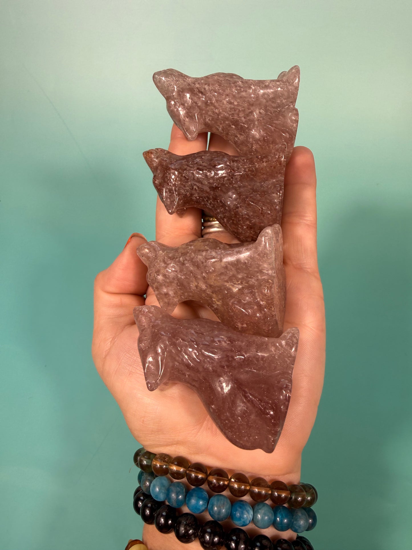 1 strawberry quartz wolf carving