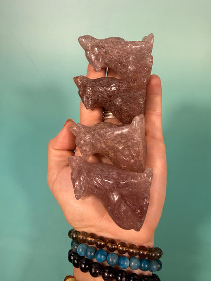 1 strawberry quartz wolf carving