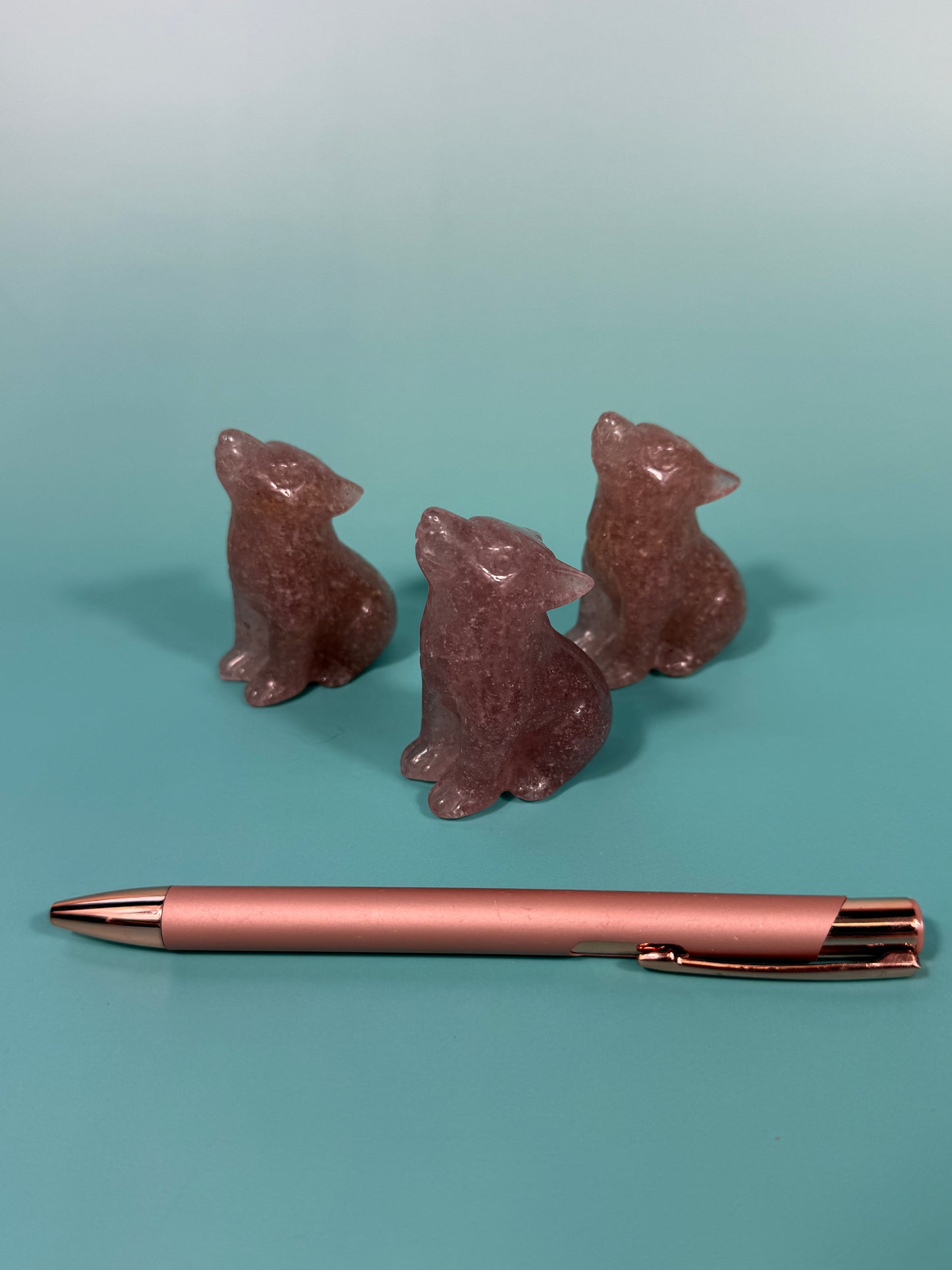 1 strawberry quartz wolf carving