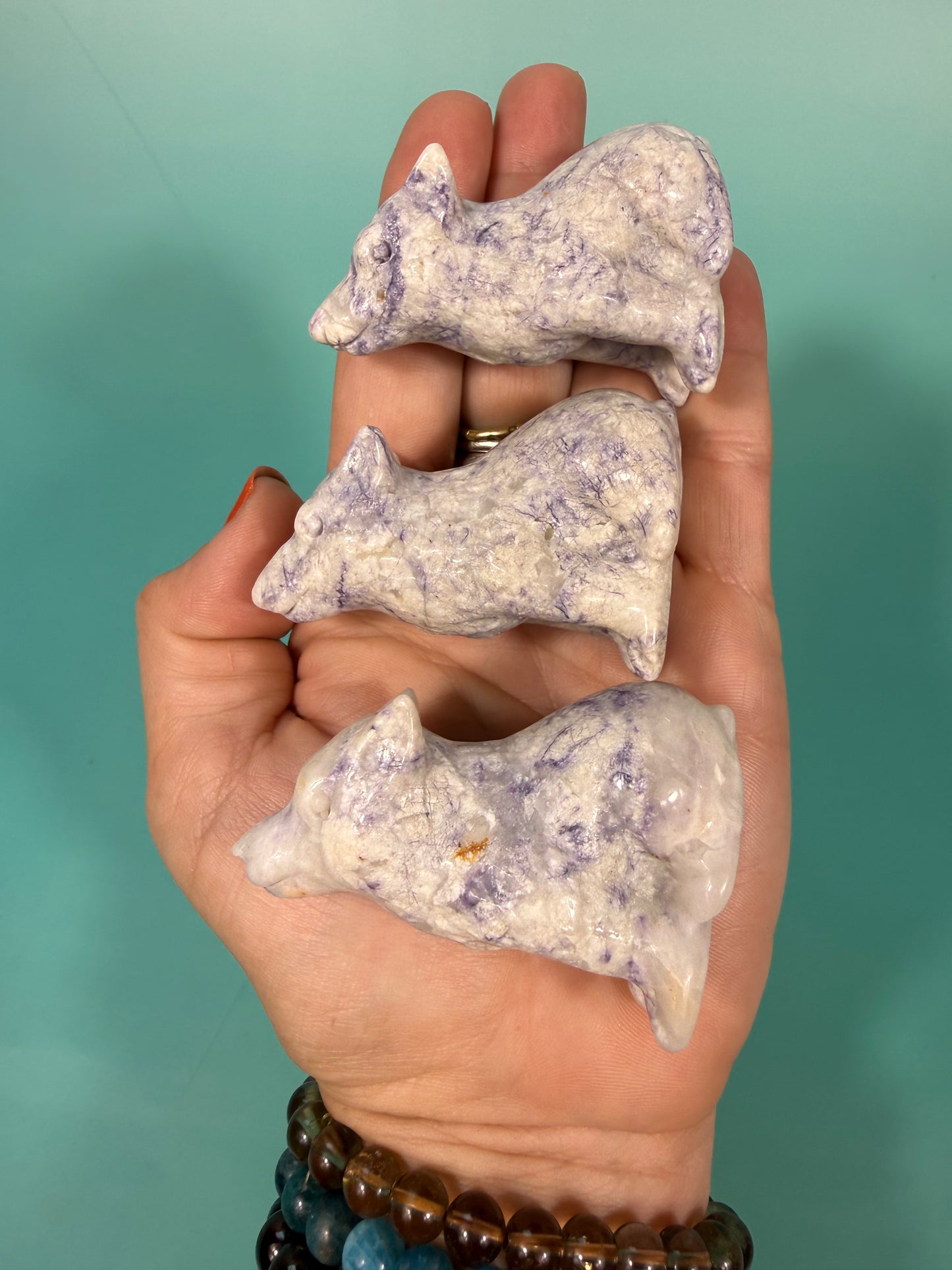 1 opalized fluorite wolf carving