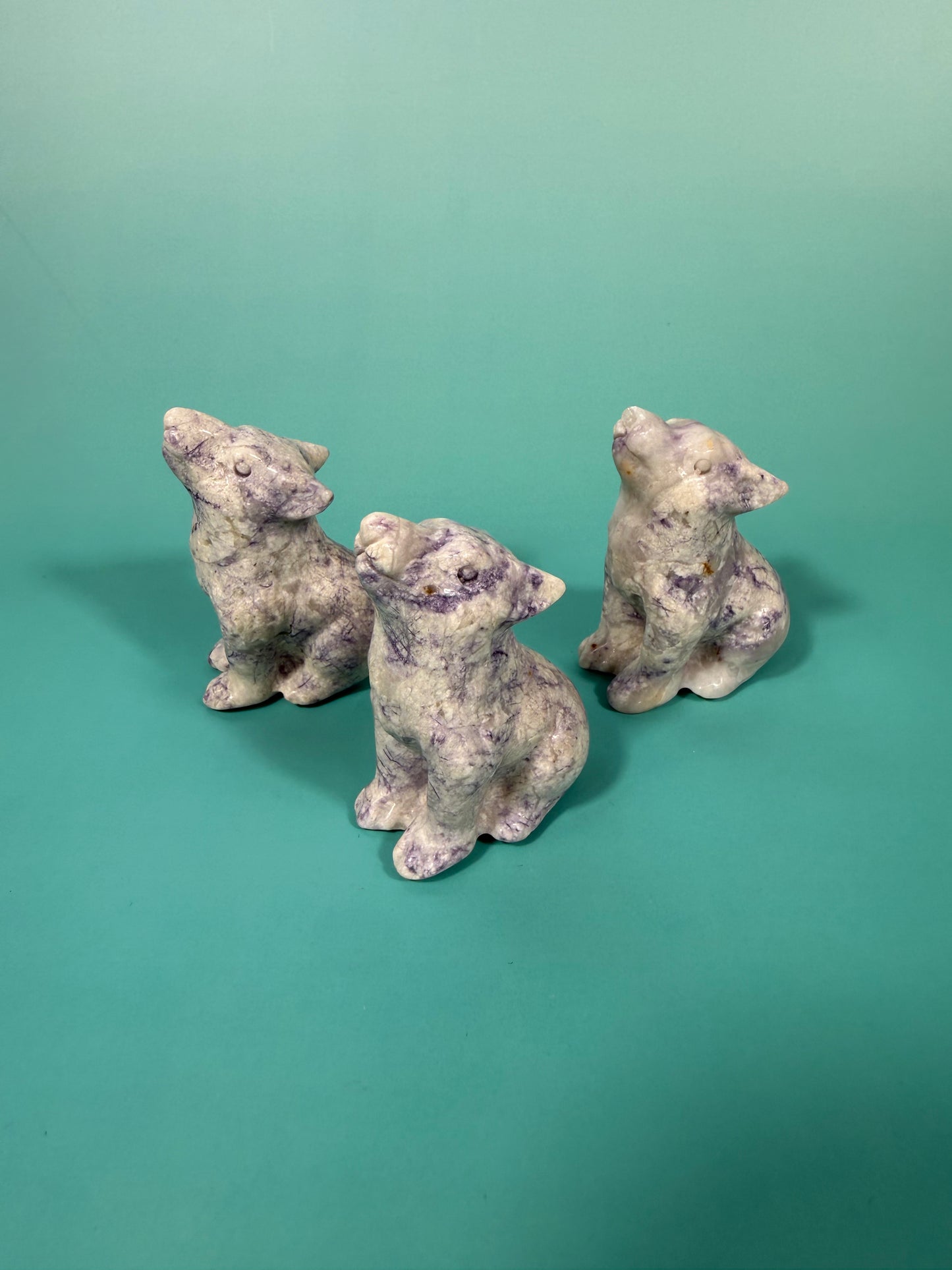 1 opalized fluorite wolf carving