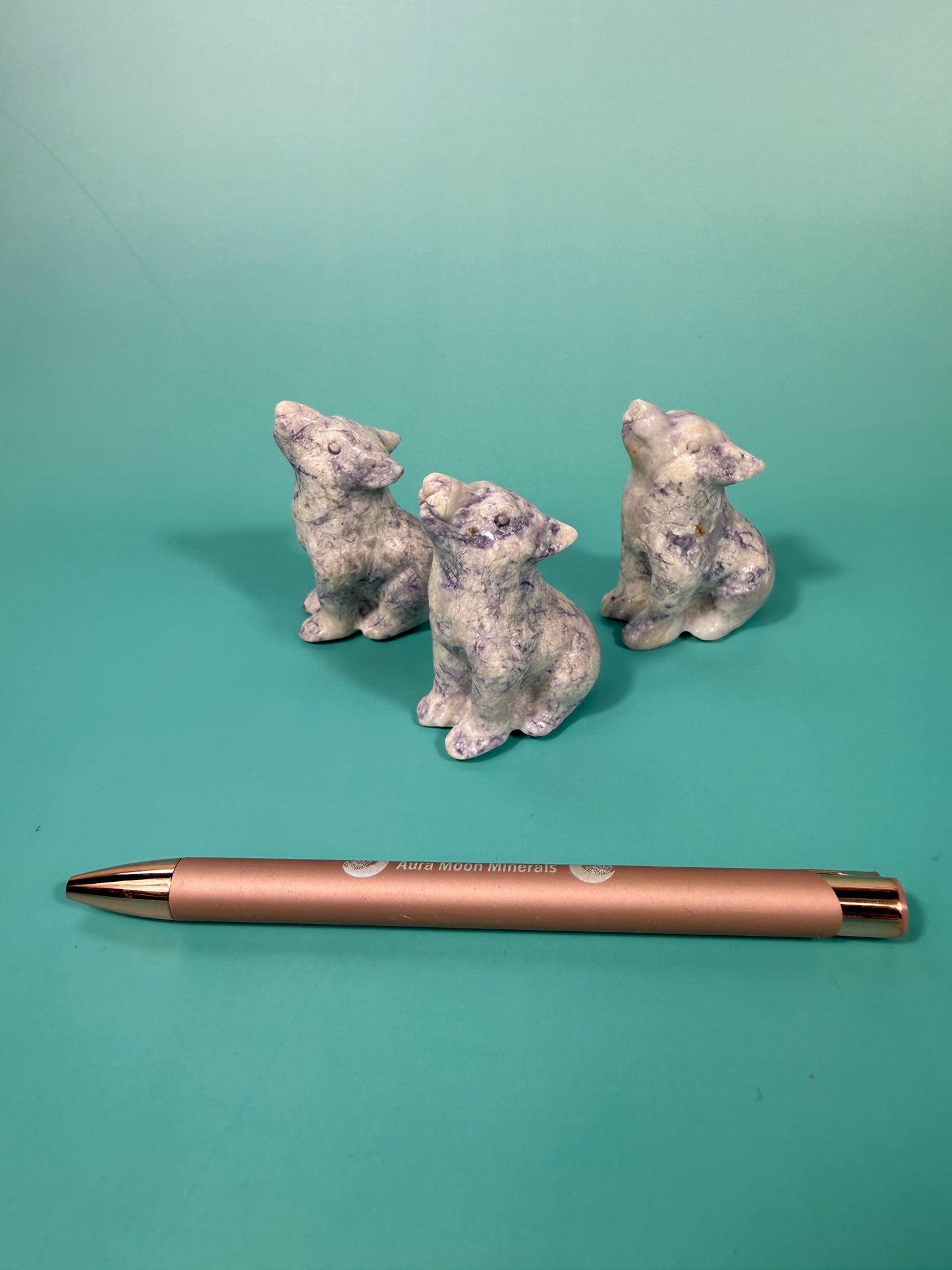 1 opalized fluorite wolf carving