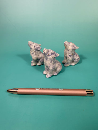 1 opalized fluorite wolf carving