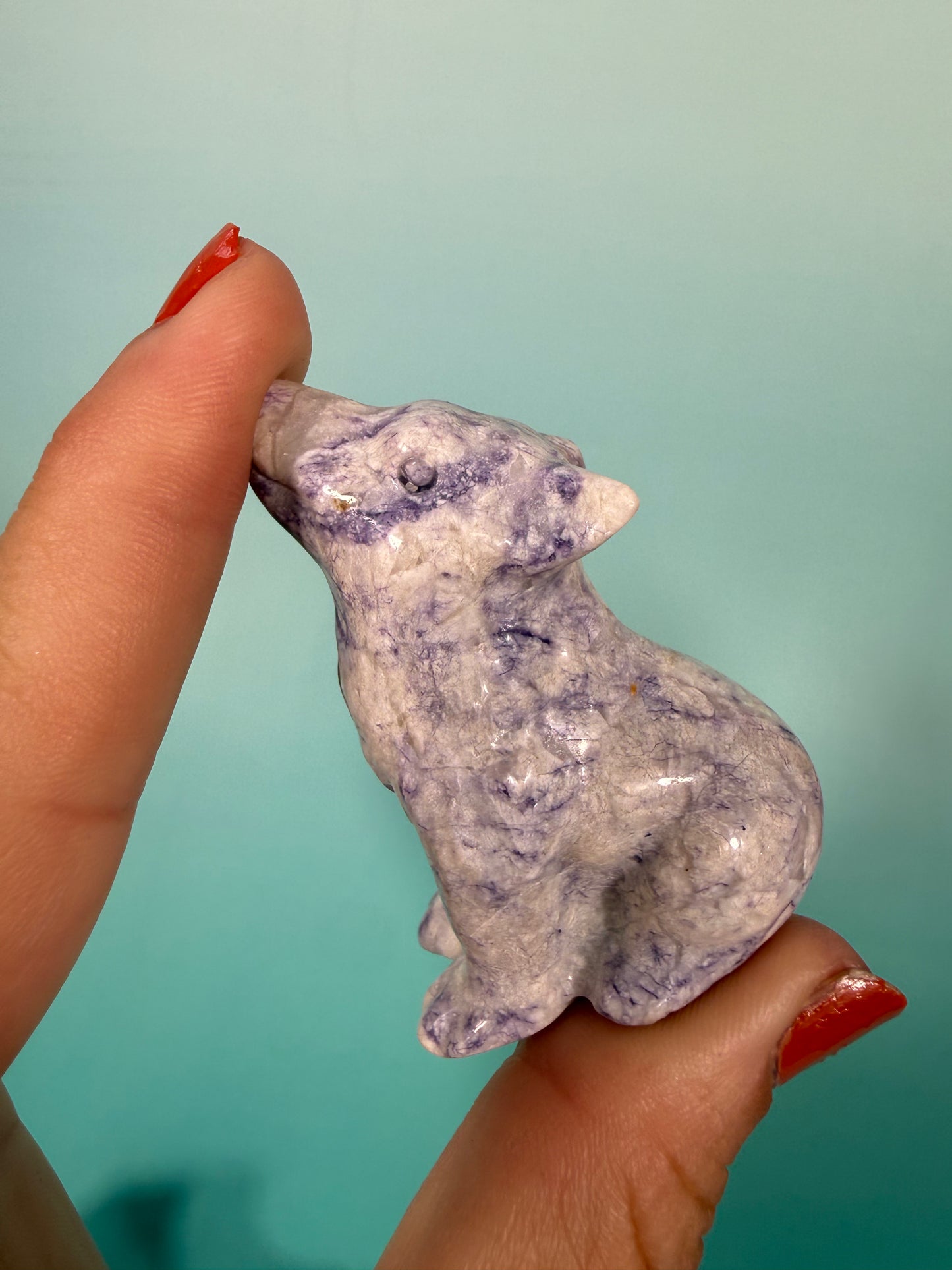 1 opalized fluorite wolf carving