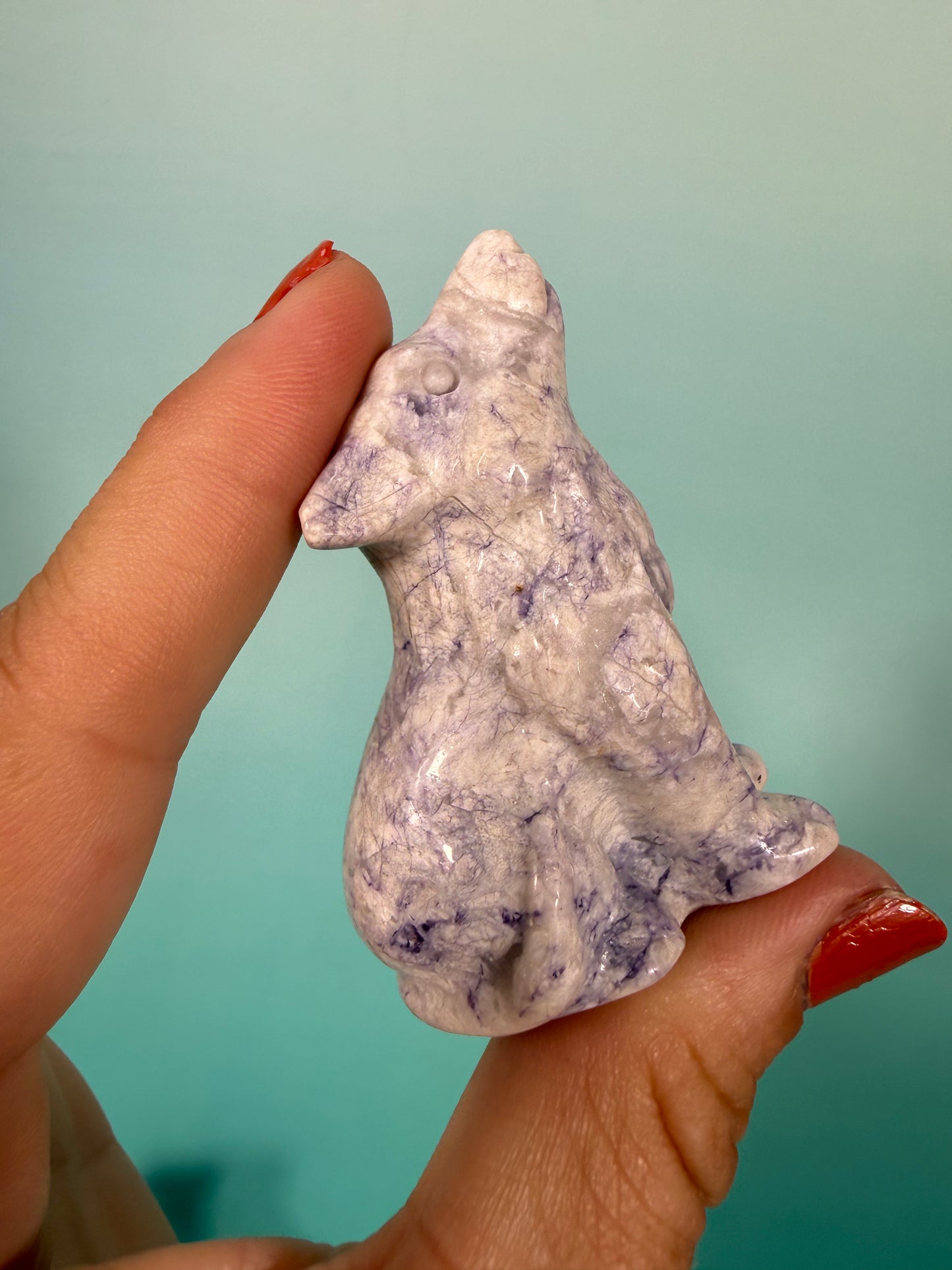 1 opalized fluorite wolf carving