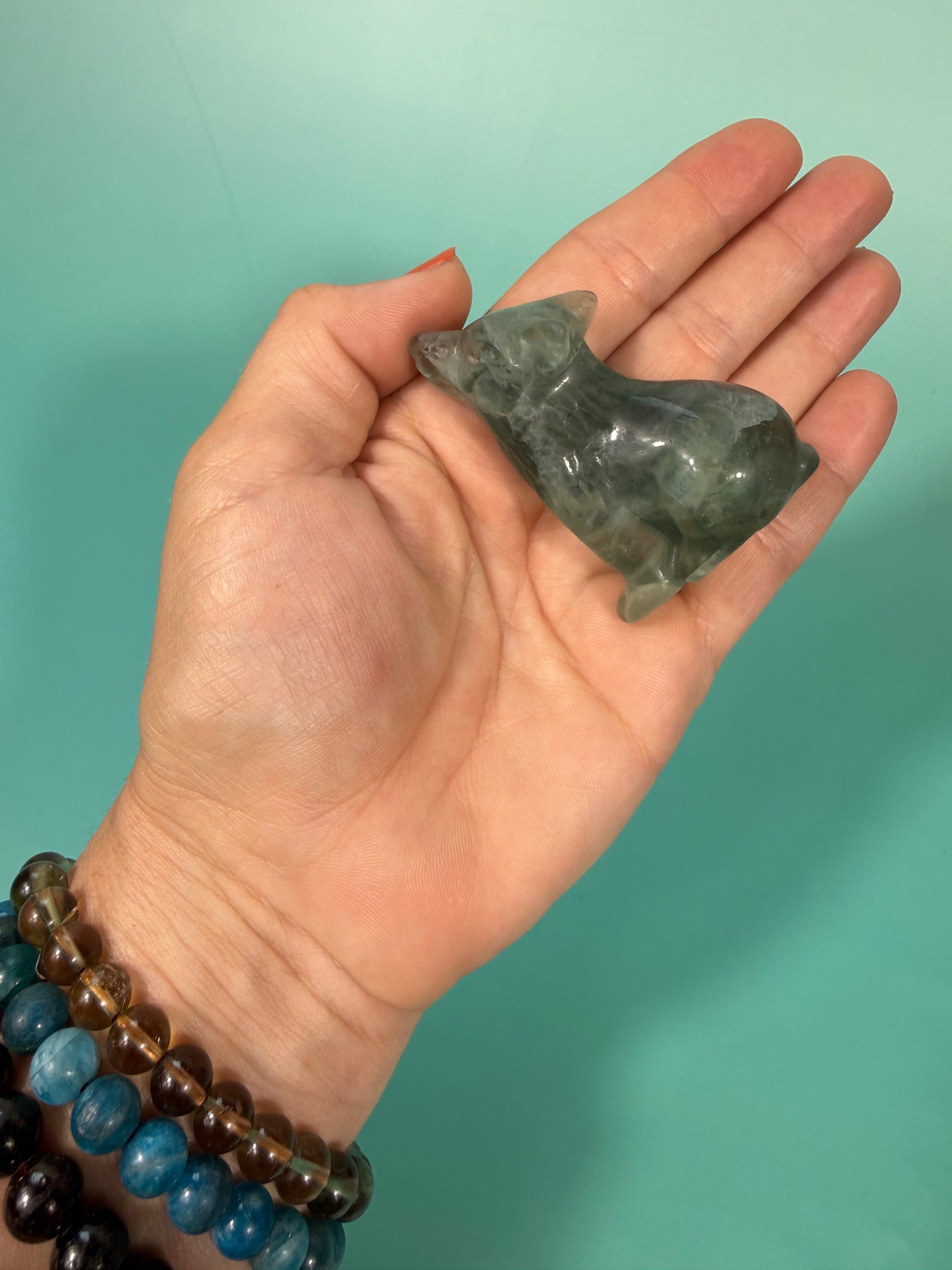 green fluorite wolf carving