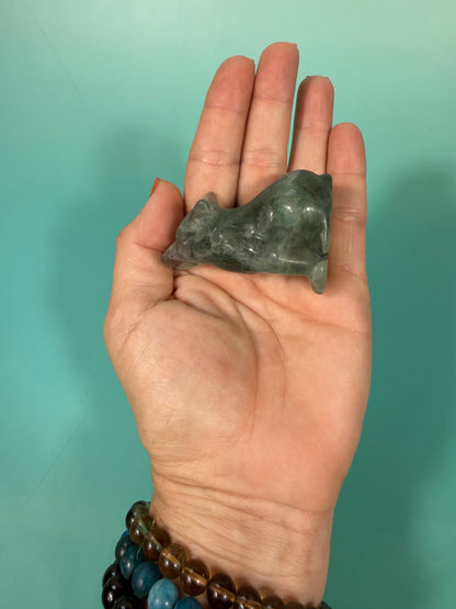 green fluorite wolf carving