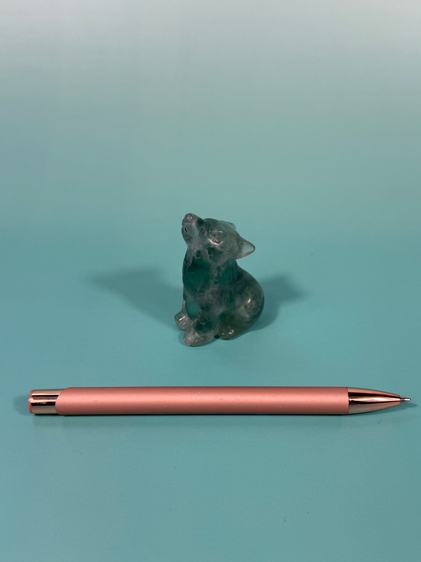green fluorite wolf carving