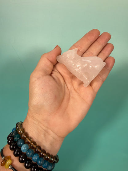 pale rose quartz wolf carving