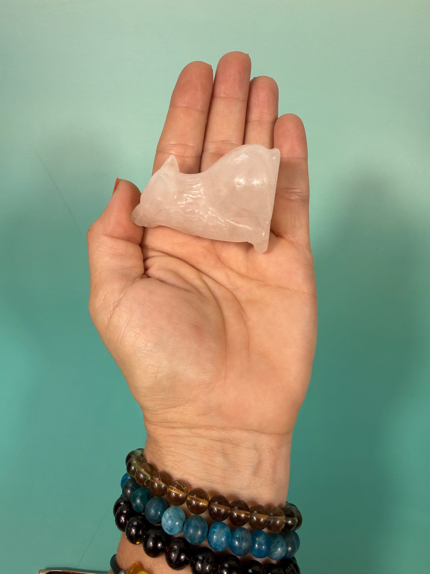 pale rose quartz wolf carving