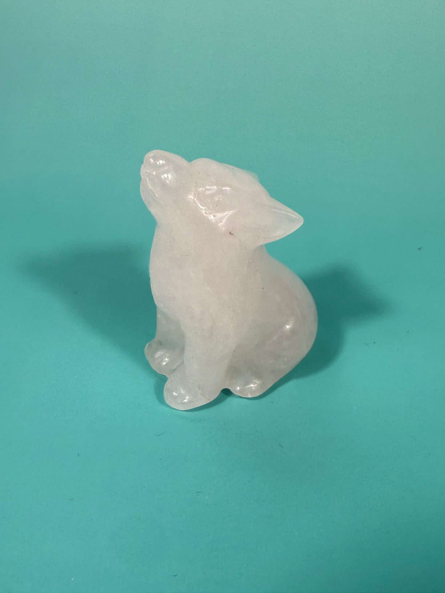 pale rose quartz wolf carving
