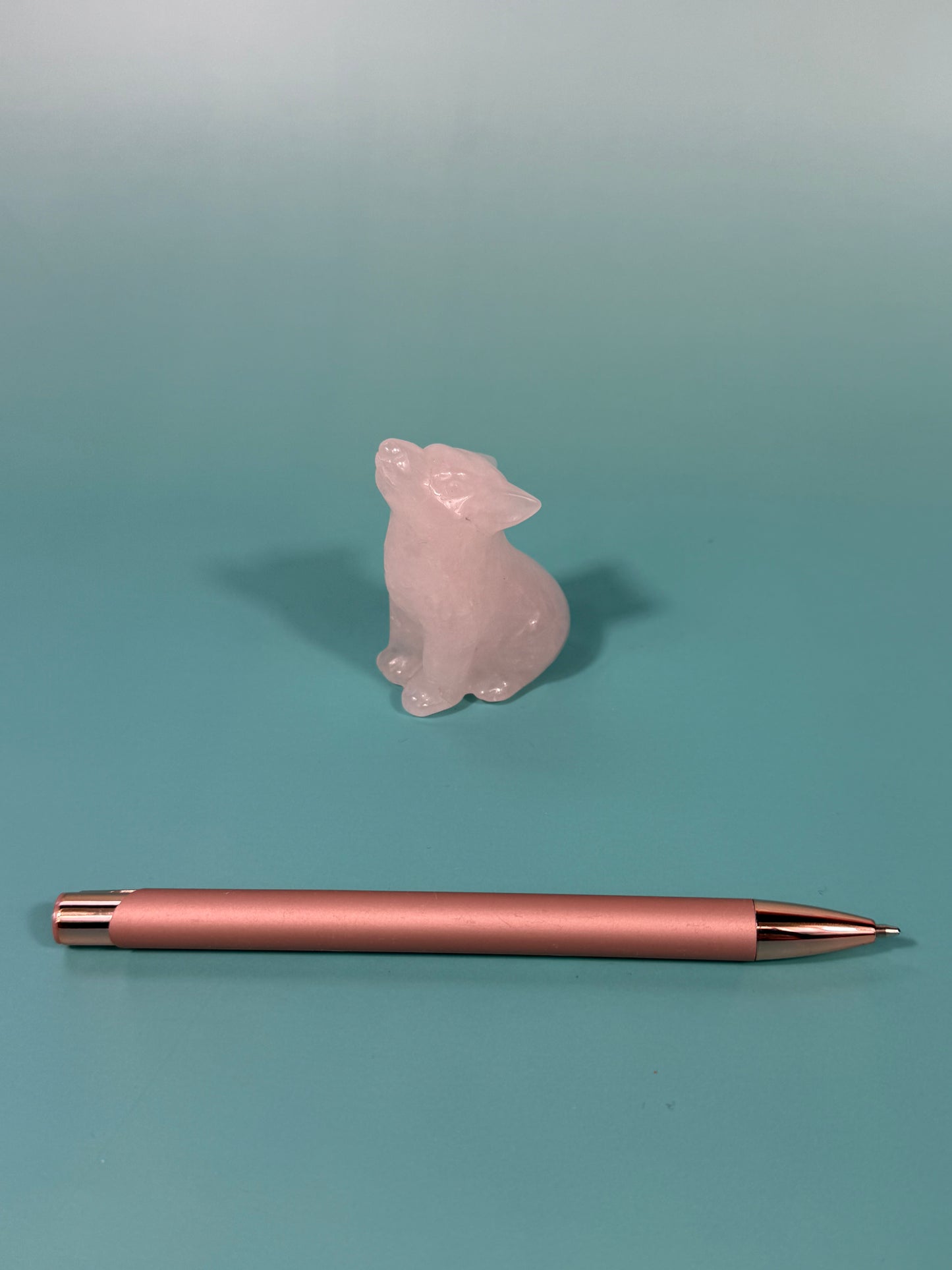 pale rose quartz wolf carving