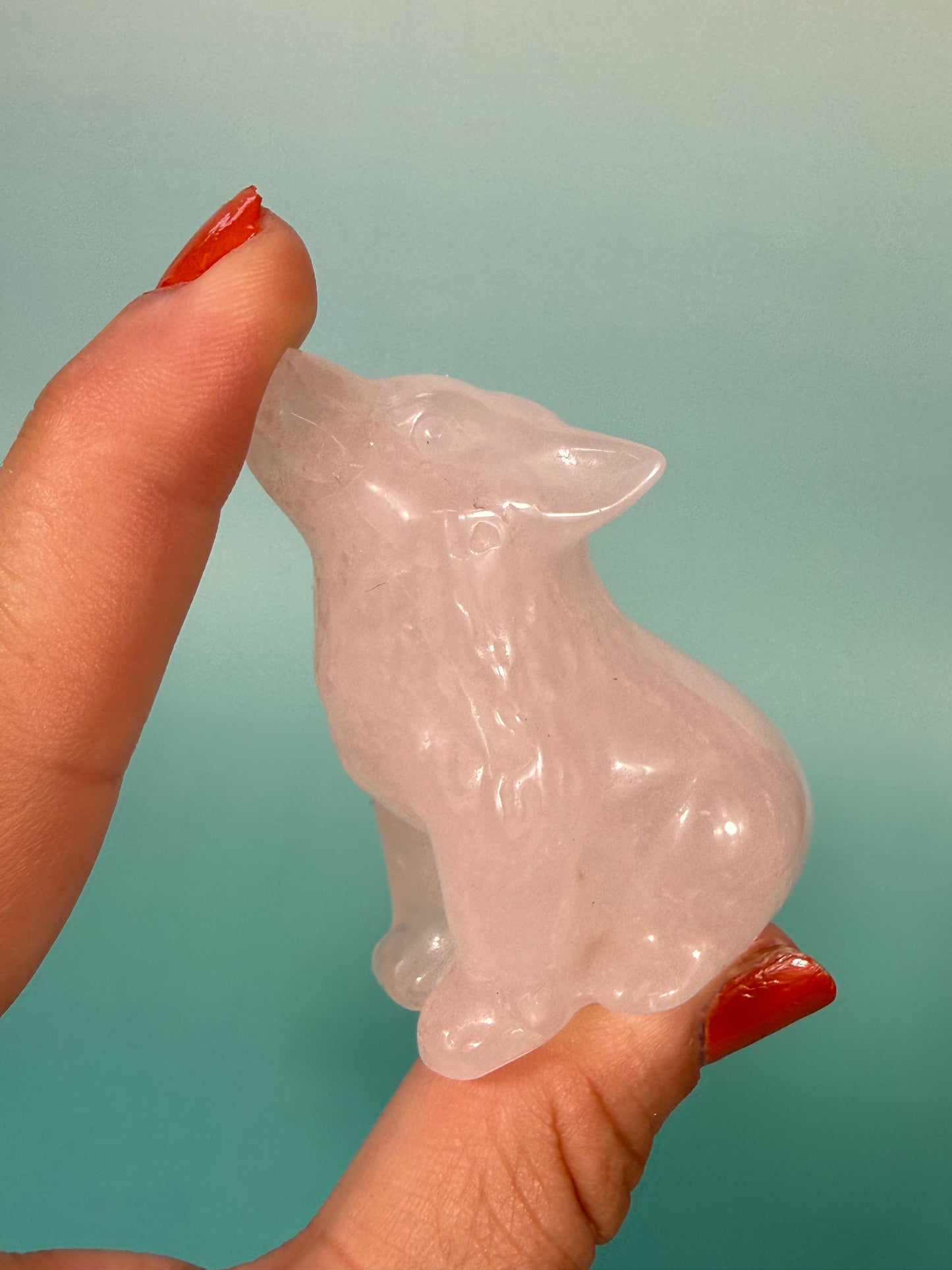 pale rose quartz wolf carving