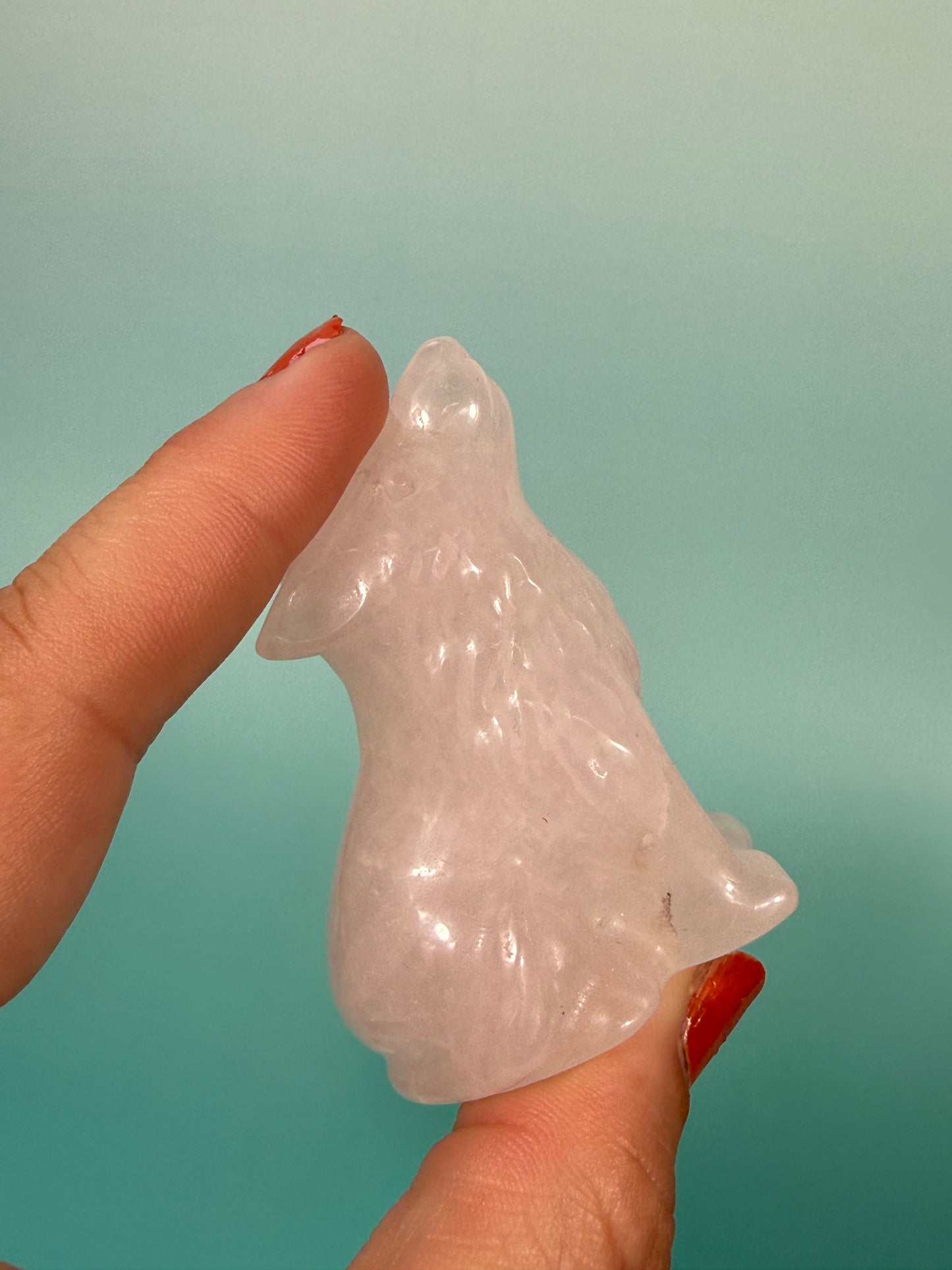 pale rose quartz wolf carving